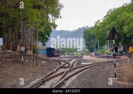 A scenic view of railway station at hill station platform of mountain village Kalakund near Mhow, Indore, Madhya Pradesh on a sunny summer day. Indian Stock Photo