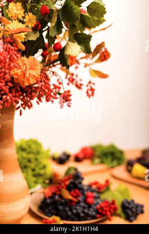 Autumn composition of fruits and vegetables on the table on a white background Stock Photo