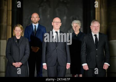 Edinburgh Scotland, UK 18 September 2022. National Moment of Reflection.with Scottish National Party politicians Jenny Gilruth, John Swinney and Angus Robertson at St Andrew’s House holding a one minute silence following the death of Her Majesty Queen Elizabeth II. credit sst/alamy live news Stock Photo