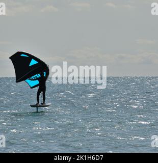 Windsurfing Water Sport - Surfers Completing The Sport On Hayling Island Beachfront Stock Photo