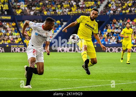 Valencia, Spain. 18th Sep, 2022. VALENCIA, SPAIN - SEPTEMBER 18: Fernando of Sevilla CF battles for the ball with Francis Coquelin of Villarreal CF during the match between Villarreal CF and Sevilla CF of La Liga Santander on September 18, 2022 at Ciutat de Valencia in Valencia, Spain. (Photo by Samuel Carreño/ PxImages) Credit: Px Images/Alamy Live News Stock Photo