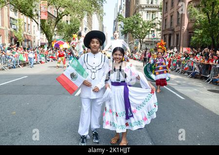 New York, USA. 18th Sep, 2022. Participants are posing for a photo on Madison Avenue, New York City during the Mexican Day Parade. (Photo by Ryan Rahman/Pacific Press) Credit: Pacific Press Media Production Corp./Alamy Live News Stock Photo