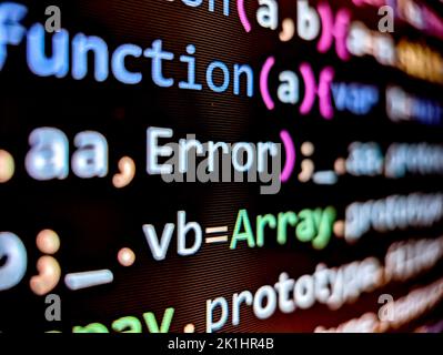 Computer code with function error text displayed on pixelated screen with colorful words on a dark background Stock Photo