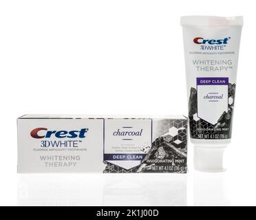 Winneconne, WI - 6 August 2022: A package of Crest 3D white whitening therapy charcoal toothpaste on an isolated background. Stock Photo