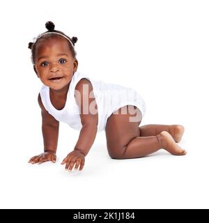 Did I show you my moves. Studio shot of an adorable baby girl isolated on white. Stock Photo