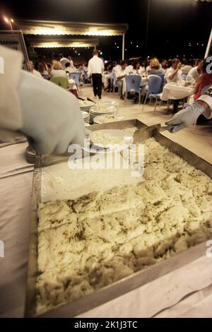 Turkish chefs preparing famous Turkish traditional dessert ‘Gullac’ in Istanbul, Turkey. Stock Photo