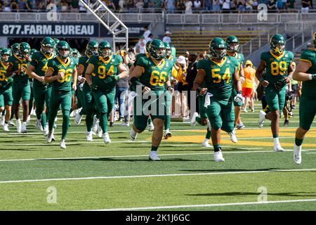 Baylor Bears offensive lineman Jacob Gall (66), Brayden Utley (54) and the team enter the field before their NCAA college Football game against the Texas State Bobcats at McLane Stadium Saturday, Sep. 17, 2022, in Waco, Tex. Baylor won 42-7. (Eddie Kelly/Image of Sport) Stock Photo