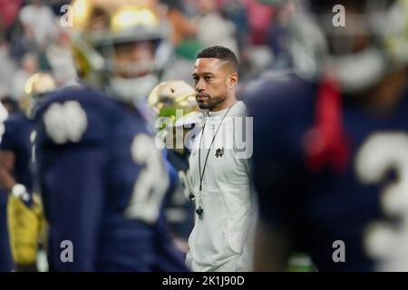 Norte Dame head coach Marcus Freeman coaches from the sidelines. Stock Photo