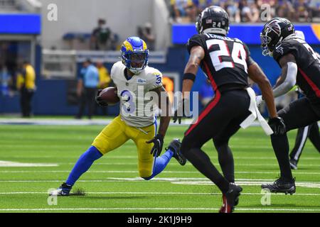 Los Angeles, CA, USA. 30th Jan, 2022. San Francisco 49ers defensive end  Nick Bosa (97) tries to tackles Los Angeles Rams running back Cam Akers  (23) In the first quarter during the