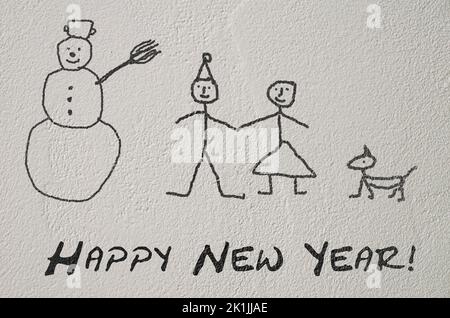 New Year greeting card painted by the children on the wall Stock Photo