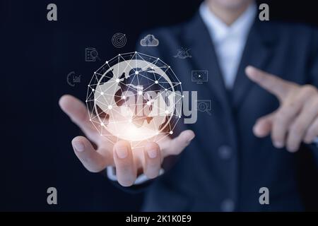 Businessman holding globe, Accessing the Technology Internet, multimedia, Storage Network connection Concept And a large database big data Through int Stock Photo