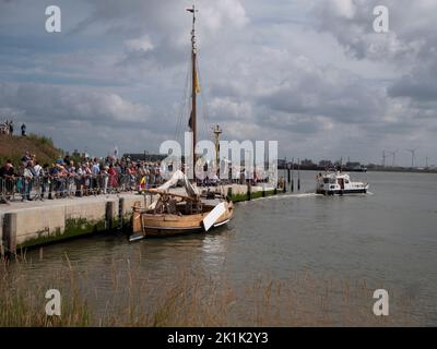 Doel, Belgium, 21 August 2022, Many people on the quay for the inauguration of boats and ships, horizontal photo Stock Photo
