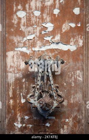 Old Weathered Door and Knocker Stock Photo
