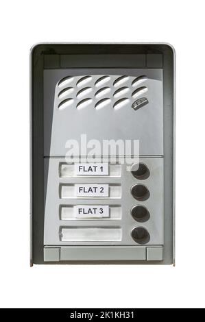 Entry doorbell intercom at a residential apartment building at a house front door, cut out and isolated on a white background, stock photo image Stock Photo