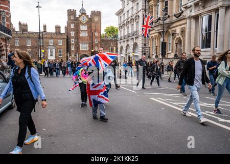 London UK. 19 September 2022. Large crowds pack  Saint James's street in West London as over a million mourners are expected to arrive for the state funeral for Queen Elizabeth II today. The Queen's coffin will be carried on a gun carriage from Westminster Hall followed by King Charles III and Camilla, Queen Consort after lying in state for four days. The Queen's state funeral will take place at Westminster Abbey (19 September 2022) followed by a private interment at St Georges's Chapel in Windsor. Credit: amer ghazzal/Alamy Live News Stock Photo