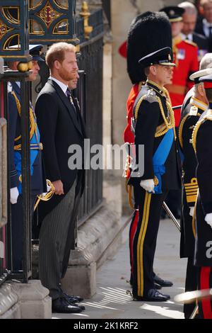 (left to right) The Prince of Wales, the Duke of Sussex and the Earl of Wessex leaving the State Funeral of Queen Elizabeth II, held at Westminster Abbey, London. Picture date: Monday September 19, 2022. Stock Photo