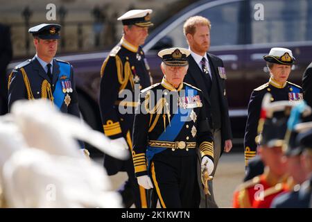 (left to right) The Prince of Wales, King Charles III, the Duke of Sussex and the Princess Royal leaving the State Funeral of Queen Elizabeth II, held at Westminster Abbey, London. Picture date: Monday September 19, 2022. Stock Photo