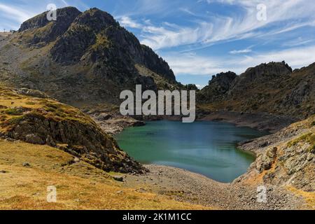 Lacs Robert and peaks Landscape of forests and mounts around Leama lake in Belledonne mountain range Stock Photo