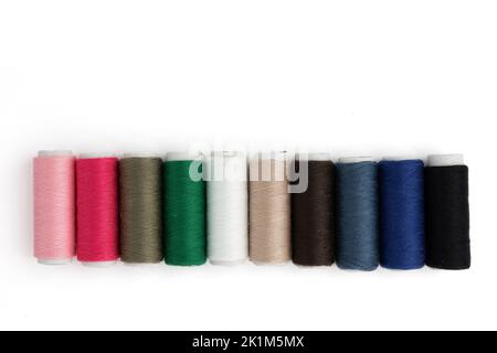 set of sewing thread coils, miscellaneous colours, isolated on white background, sewing theme Stock Photo