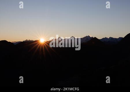 sunrise with Eiger Mönch and Jungfrau seen from Diemtigtal Stock Photo