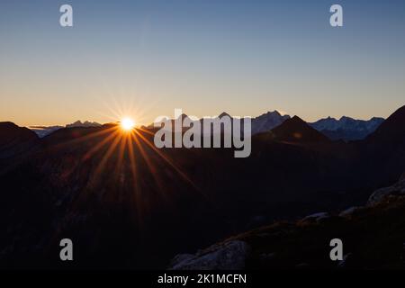 sunrise with Eiger Mönch and Jungfrau seen from Diemtigtal Stock Photo