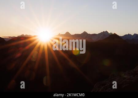 sunrise with Eiger Mönch and Jungfrau seen from Diemtigtal Stock Photo