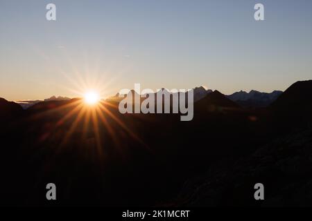 sunrise with Eiger Mönch and Jungfrau seen from Diemtigtal Stock Photo