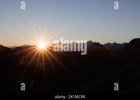 sunrise with Eiger Mönch and Jungfrau seen from Diemtigtal Stock Photo