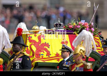 London, UK. 19th Sep, 2022. The State Gun Carriage carries the coffin of Queen Elizabeth II, draped in the Royal Standard with the Imperial State Crown and the Sovereign's orb and sceptre, in the Ceremonial Procession following her State Funeral at Westminster Abbey, London. September 19, 2022. Photo by Ammar Abd Rabbo/ABACAPRESS.COM Credit: Abaca Press/Alamy Live News Stock Photo