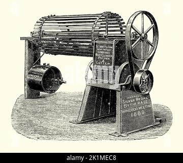 An old Victorian engraving a patent combined root cleaner, pulper, fingerer and slicer made by of Corbett and Son, Wellington, Shropshire, England, UK. It is from a book of 1890. The agricultural equipment was designed to be horse powered. The root vegetables are fed by hopper and are cleaned by being thrown about in the revolving barrel cylinder. Stock Photo