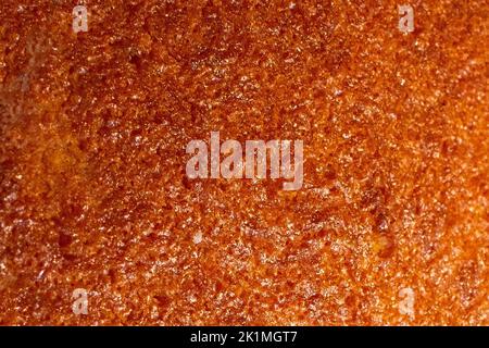 Brown abstract rough sandpaper texture with grain details Stock Photo