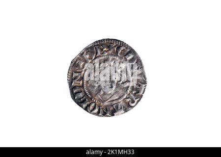 Silver long cross penny English hammered coin of King Henry II of the 14th century dated around 1310- 1314 minted in Canterbury England, cut out and i Stock Photo