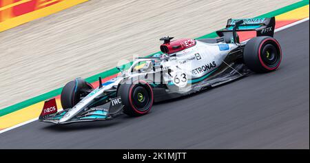 George Russell driving his Mercedes AMG Petronas F1 car at the Spa Francorchamps circuit during the Belgium grand prix, August 2022 Stock Photo