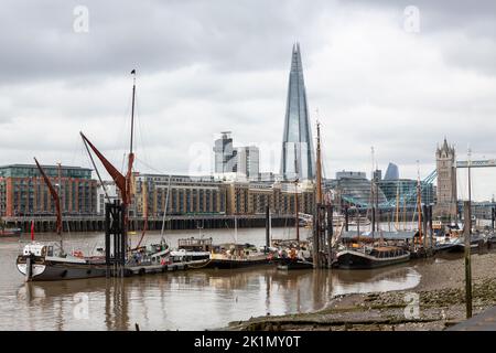 View of the River Thames in London on an Autumn day. Barges near saint katharine dock in the foreground. Stock Photo