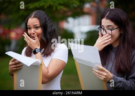 2022 A Level results day at in South Manchester. Celebrating their results success at Whalley Range High School. Stock Photo