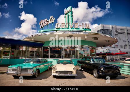 Universal Studios Florida theme park Mels drive in cafe with 1960’s American classic cars Stock Photo