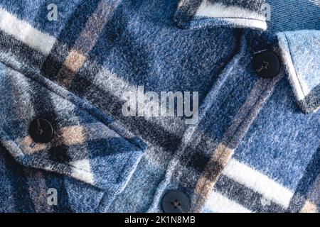 Close-up, autumn warm textural blue plaid shirt. Stock Photo