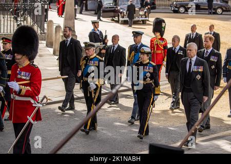 London, UK. 19th Sep, 2022. Britain's King Charles III, Princess Anne and Prince Andrew follow the coffin of Queen Elizabeth II, draped in the Royal Standard, on the State Gun Carriage of the Royal Navy, during the funeral procession from Westminster Abbey, in London, England on Monday, September 19, 2022. Photo by UK Ministry of Defense/UPI Credit: UPI/Alamy Live News Stock Photo