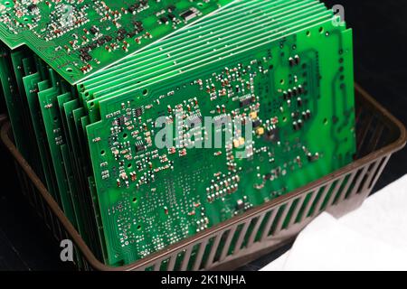 Stack of produced printed circuit boards with surface mounted components. . High quality photo Stock Photo