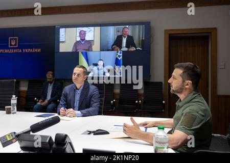 Kyiv, Ukraine. 19th Sep, 2022. Ukrainian President Volodymyr Zelenskyy, speaks during a remote video meeting with Larry Fink, CEO of BlackRock Investments, on driving public and private investments into rebuilding Ukraine from the Mariinskyi Palace, September 19, 2022 in Kyiv Ukraine. Credit: Ukrainian Presidential Press Office/Ukraine Presidency/Alamy Live News Stock Photo