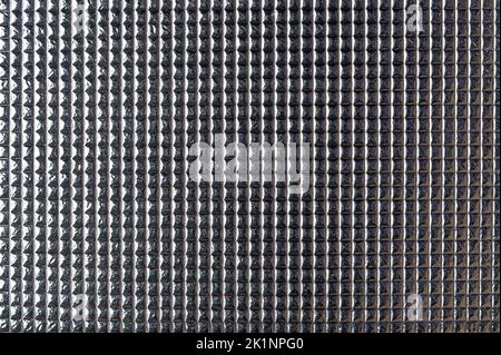 Silver matellic pattern background.  Texture of metal grid Stock Photo