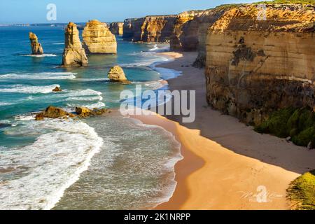 The Twelve Apostles is a collection of limestone stacks off the shore of Port Campbell National Park, by the Great Ocean Road in Victoria, Australia. Stock Photo