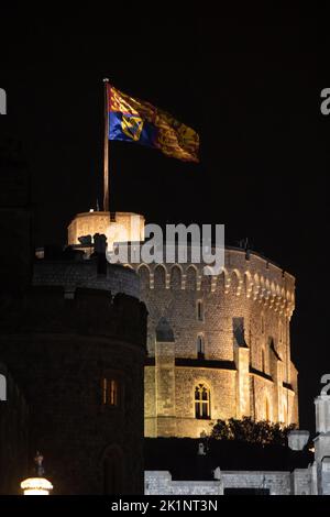 Windsor, Berkshire, UK. 19th September, 2022. The ceremonial Royal Standard flys on the Round Tower at Windsor Castle as Her Majesty the Queen is laid to rest. Credit: Maureen McLean/Alamy Live News Stock Photo