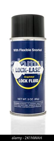 Winneconne, WI - 18 August 2022: A can of AGS lock ease graphite lubricant lock ease lock fluid on an isolated background. Stock Photo