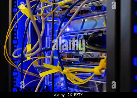 Telecommunication technology equipment - fiber optic cables and switch Stock Photo