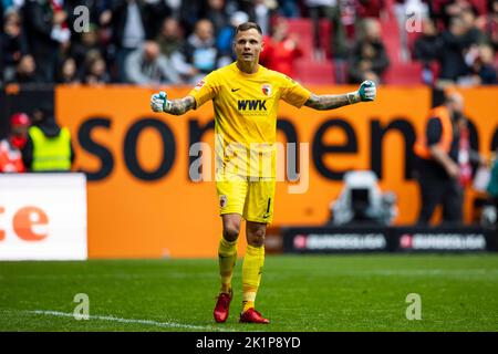 Augsburg, Germany. 17th Sep, 2022. Soccer: Bundesliga, FC Augsburg - Bayern Munich, Matchday 7, WWK Arena. Augsburg goalkeeper Rafal Gikiewicz celebrates after the game. Credit: Tom Weller/dpa/Alamy Live News Stock Photo