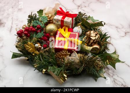 Christmas gift boxes and Christmas gift boxes on marble table. Christmas ornaments. Stock Photo