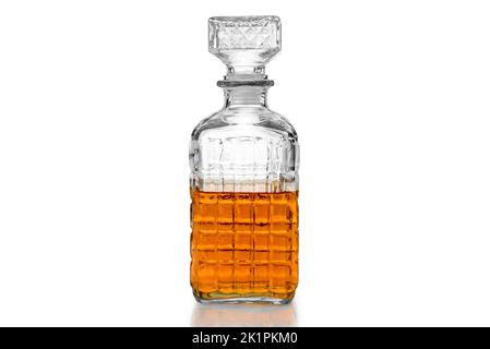 Whiskey in decorated crystal glass bottle, whiskey or bourbon in vintage bottle isolated on white, clipping path Stock Photo