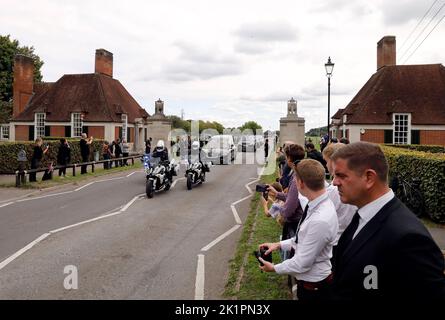 The State Hearse carries the coffin of Queen Elizabeth II, draped in the Royal Standard with the Imperial State Crown and the Sovereign's Orb and Sceptre, as it travels through Runnymede on its journey from the State Funeral at Westminster Abbey, London, to a Committal Service at St George's Chapel in Windsor Castle, Berkshire. Picture date: Monday September 19, 2022. Stock Photo