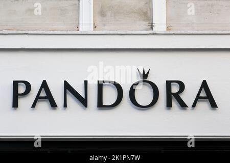 Copenhagen, Denmark - October 14, 2021: Pandora logo on a wall. Pandora is a Danish jewellery manufacturer and retailer founded in 1982 Stock Photo